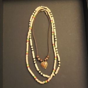 Necklace,  wooden beads and a heart necklace